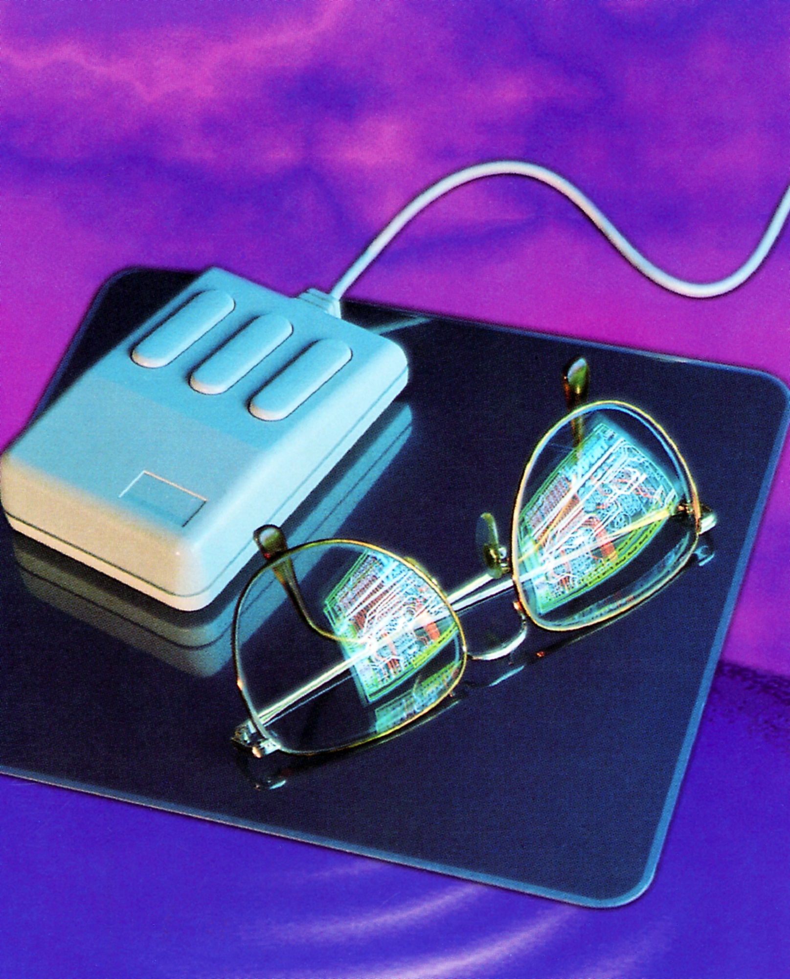 Computer mouse and eyeglasses with computer screen reflection